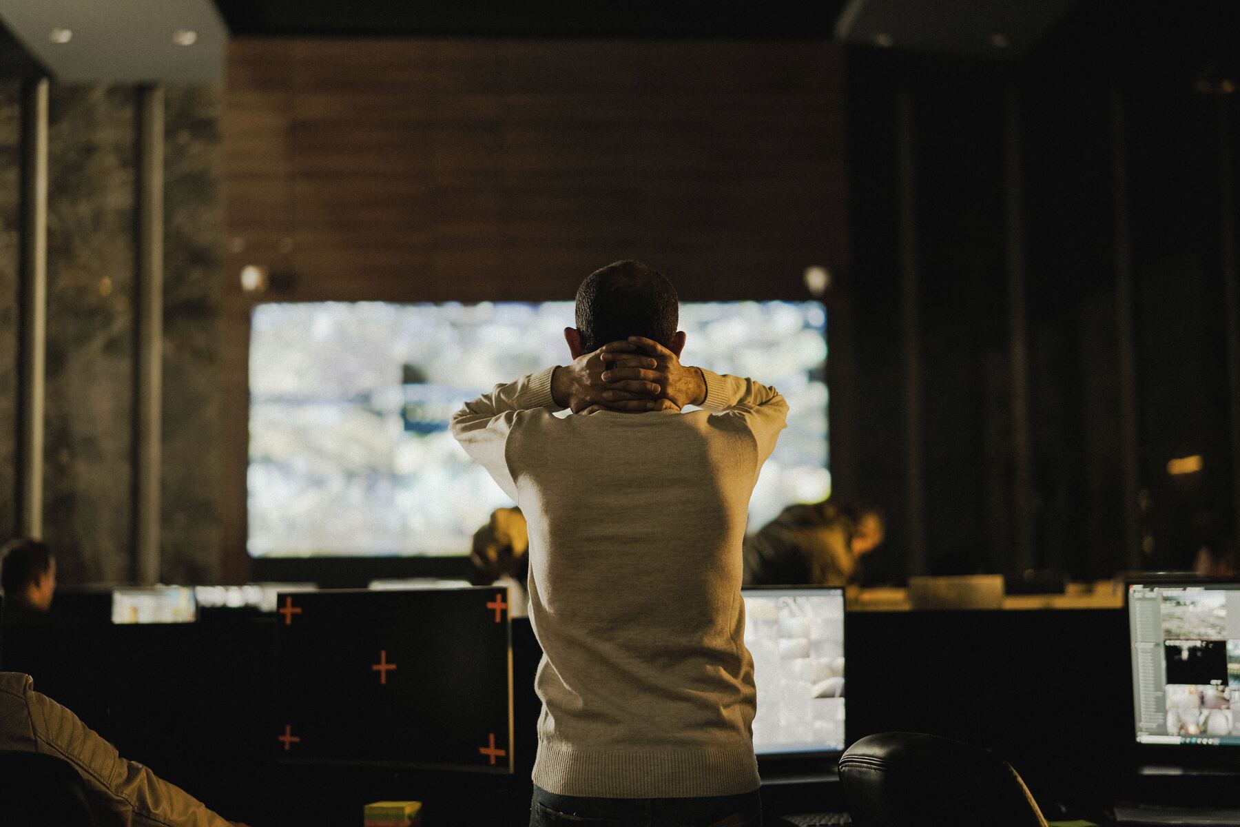 Command centre overseeing multiple site monitors