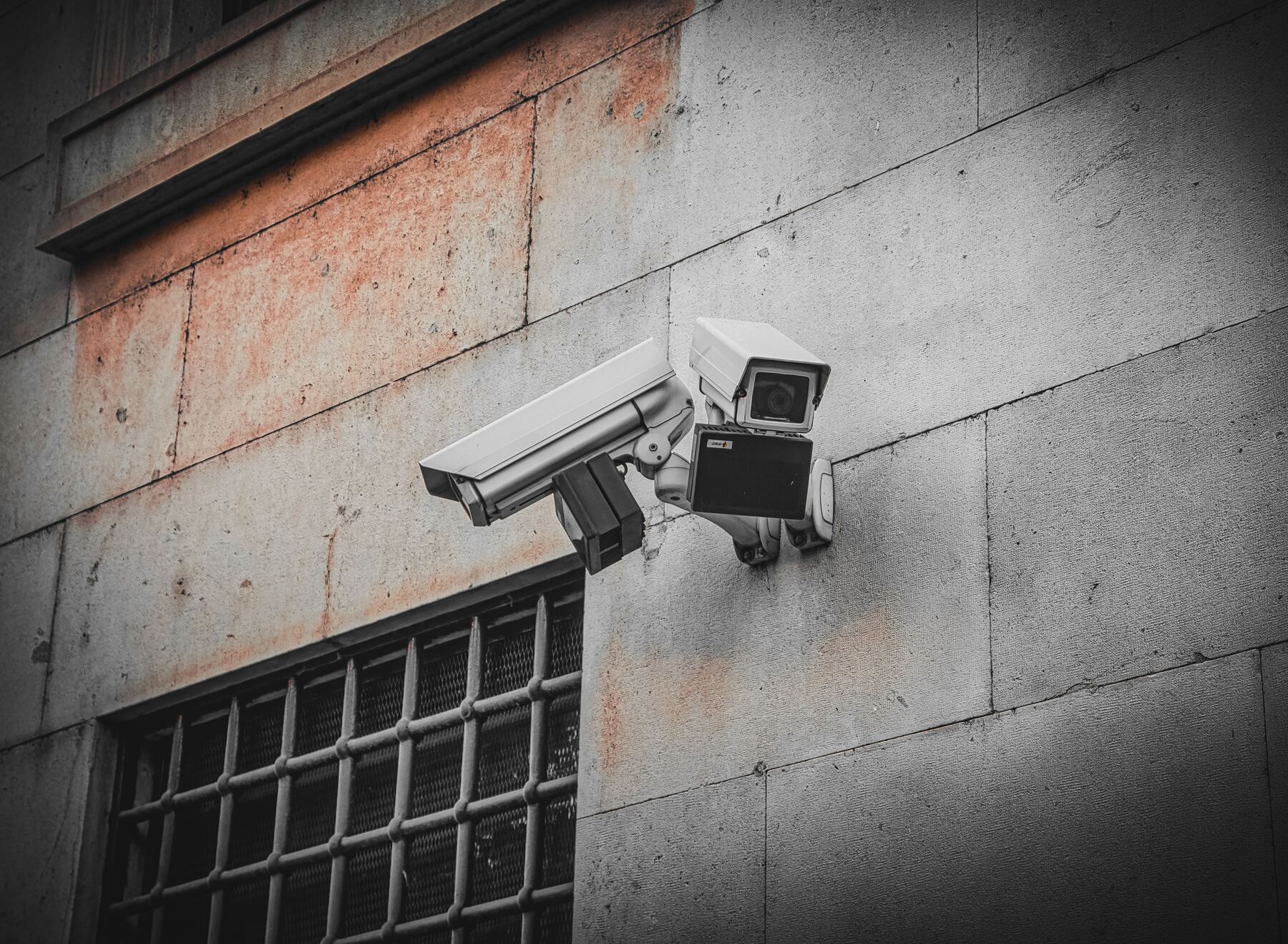 CCTV cameras mounted on a building corner